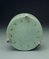 Zun vessel with linear decoration in light bluish-green glaze