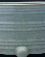 Zun vessel with linear decoration in light bluish-green glaze