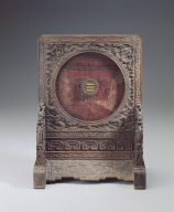 Jade bi disk with twin-bodied animal mask design