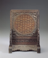 Jade bi disk with twin-bodied animal mask design