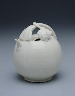 Gourd-shaped ewer with vine handle in white glaze