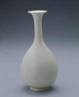 Long-necked vase with incised lotus design in white glaze