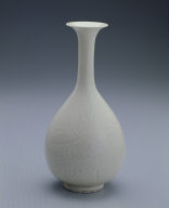 Long-necked vase with incised lotus design in white glaze