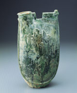 Green-glazed ewer in the shape of a leather pouch