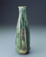 Green-glazed ewer in the shape of a leather pouch