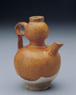 Yellow-glazed pitcher in the shape of a gourd