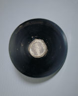 Black glazed bowl with leaf pattern
