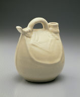 White-glazed ewer in the shape of a leather pouch