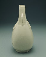 Squarish ewer with applied mask and dragon shaped handles in white glaze