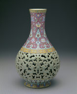 Doubled-vase with dragon design in open-work and famille rose