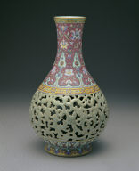 Doubled-vase with dragon design in open-work and famille rose
