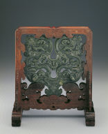 Wood stand with jade plague