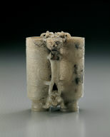 Jade adjacent cup. Imitation of Han bronze. Carving of eagle and bear used as a pun on the words Ying (falcon) and Xiong (bear)