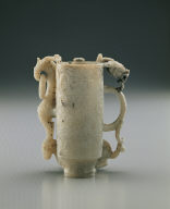 Jade adjacent cup. Imitation of Han bronze. Carving of eagle and bear used as a pun on the words Ying (falcon) and Xiong (bear)