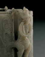 Jade adjacent cup. Imitation of Han bronze. Carving of eagle and bear used as a pun on the words Ying (falcon) and Xiong (bear)