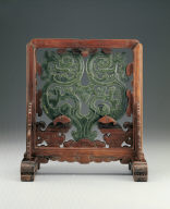 Wood stand with jade plague