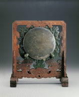 Wood stand with jade plague