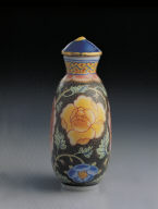 Glass bodied painted enamel snuff bottle with floral design