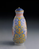 Glass bodied painted enamel snuff bottle with floral design