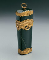 Green stone box contains pencil, scissor, etc.