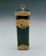 Green stone box contains pencil, scissor, etc.