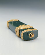 Green stone box contains pencil, scissor, etc.