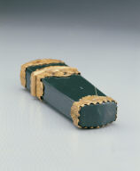 Green stone box contains pencil, scissor, etc.