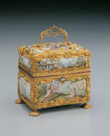 Painted enamel box contains cosmetic bottles, knife, etc.