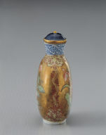 Glass bodied painted enamel snuff bottle with lotus design
