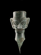 Bronze human head with flat top