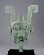 Bronze ritual vessel in the shape of a double-faced human figure