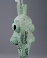 Bronze ritual vessel in the shape of a double-faced human figure