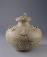 Covered jar in celadon glaze with underglaze painting of winged figure