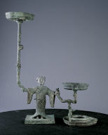 Bronze lamp with support of silver-headed human figure