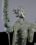 Bronze lamp with support of silver-headed human figure
