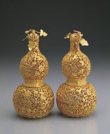Pair of gold gourds with decorations of assorted auspicious motifs