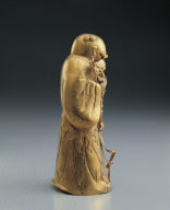 Gold sculpture of The Eight Immortals: Han Xiang-zi