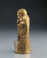 Gold sculpture of The Eight Immortals: Han Xiang-zi