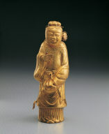 Gold sculpture of The Eight Immortals: He Xian-gu