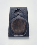 Inkstone with tied pouch design and inscription of Yuan-feng period, refined clay