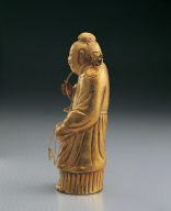 Gold sculpture of The Eight Immortals: He Xian-gu