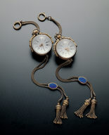 Pair of transparent globular pocket watches