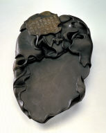 Inkstone with design of insects and melon leaves. Use attributed to Mi Fu