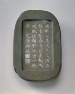 Old red-veined stone inkstone shaped like a parrot