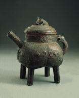 Bronze He vessel with interlacing dragon motif