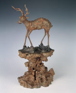 Gnarled wood carving of the auspicious deer and lingzhi motifs