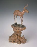 Gnarled wood carving of the auspicious deer and lingzhi motifs