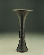 Bronze Gu vessel with animal mask motif