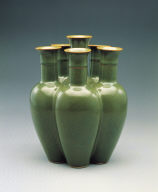 A six-sectioned conglomerated vase in teadust glaze