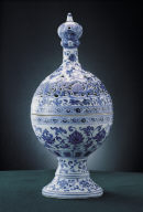 Perfumer with openwork decor and floral pattern in underglaze blue